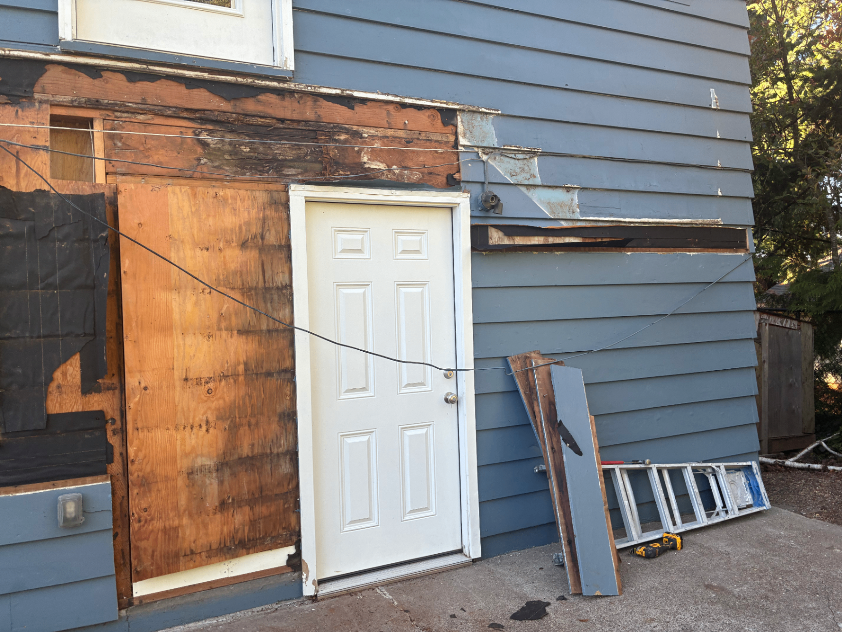 Rotten Beam and Siding Replacement — Before