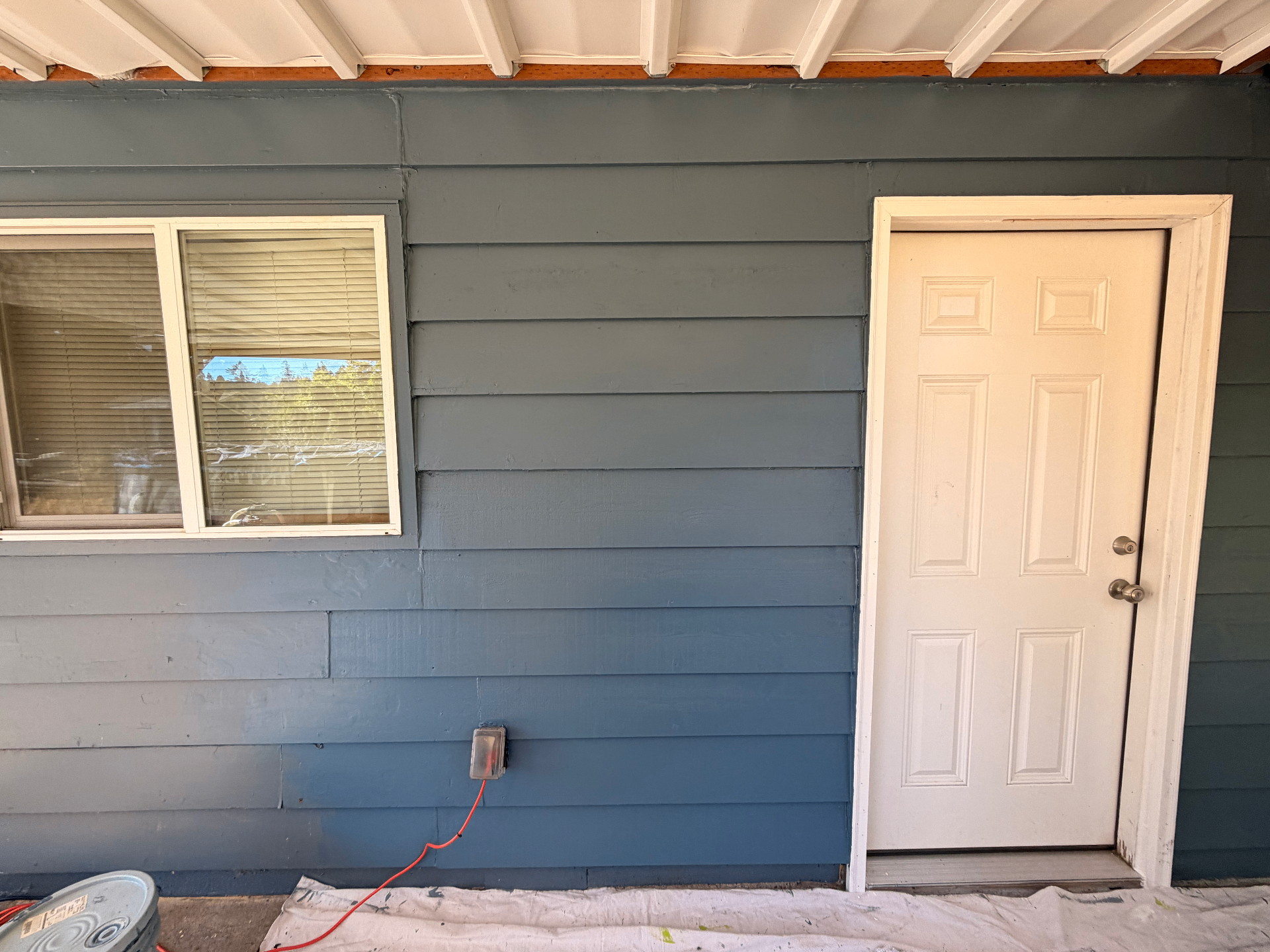Rotten Beam and Siding Replacement — After